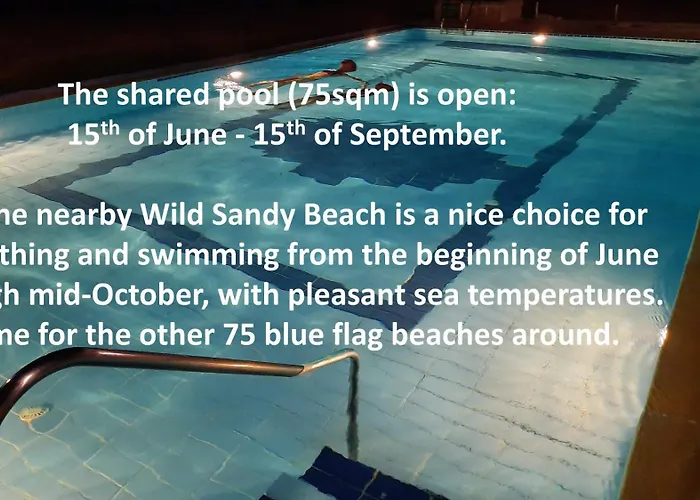 Blue Pastel-Cliffside Villa, Shared Pool, Wild Sandy Beach Nearby