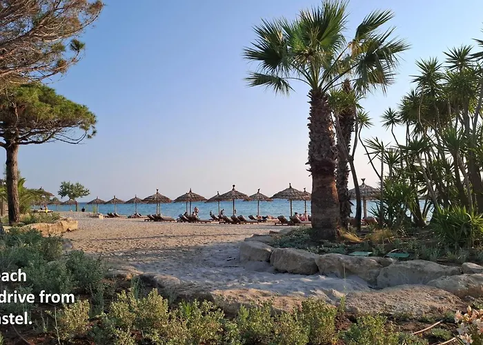 Blue Pastel-Cliffside Villa, Shared Pool, Wild Sandy Beach Nearby